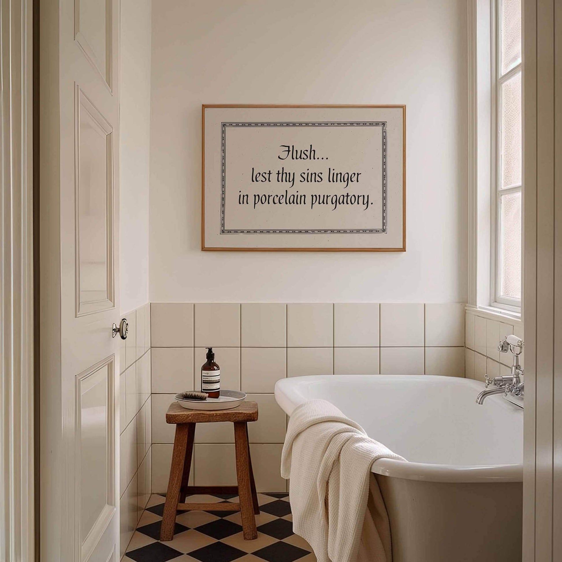 a bathroom with a white bathtub, a wooden stool, and a framed quote on the wall.