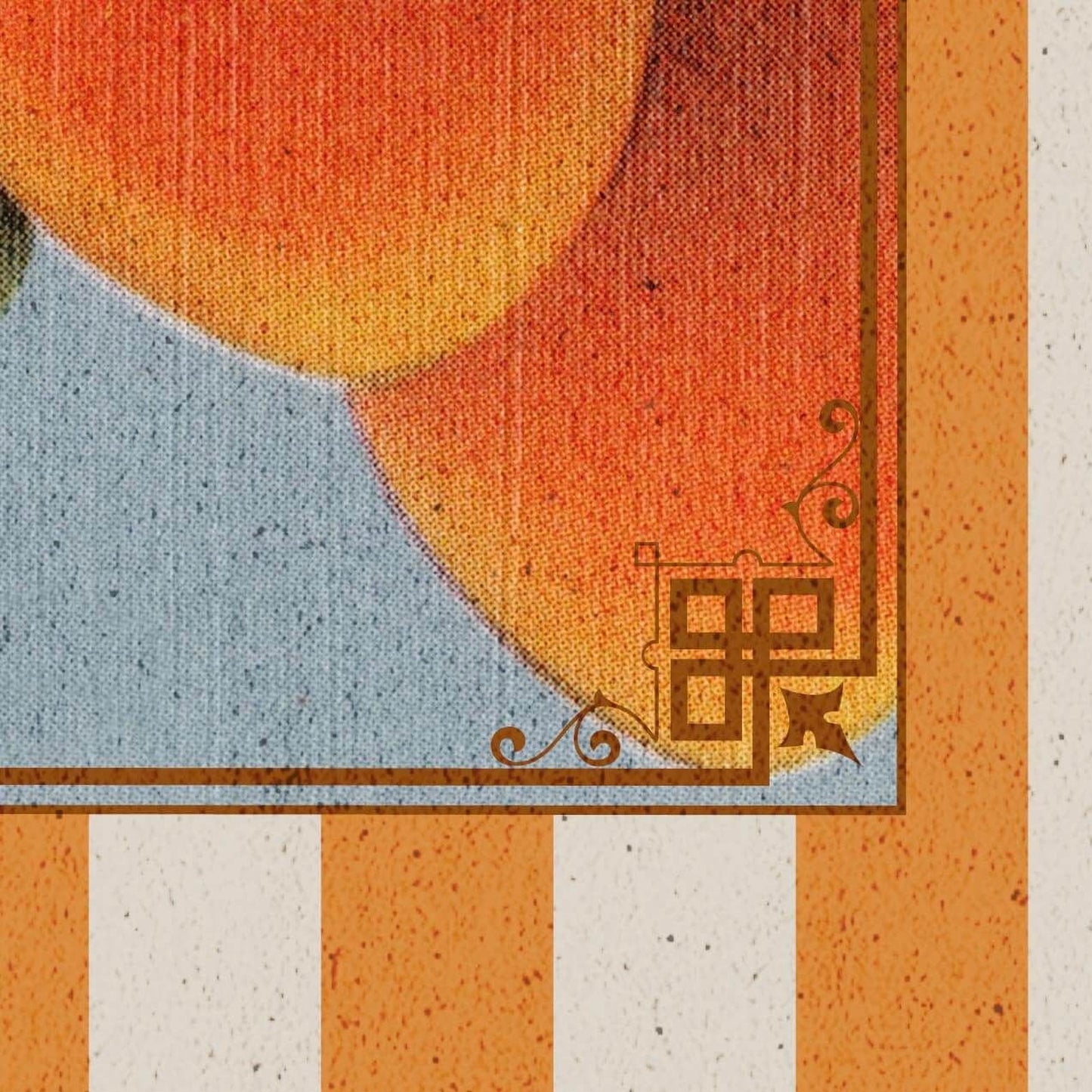 a close-up view of a vibrant, abstract design with a mix of orange, yellow, and blue colors. The design includes a decorative border with a geometric pattern and a small, stylized element.